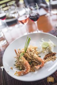 Dine at The Sala and enjoy a Pad Thai with a glass of wine