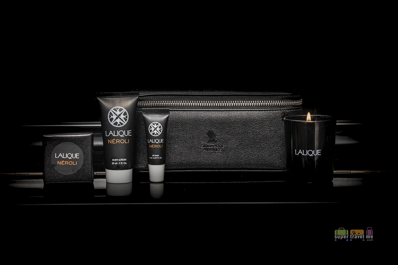 Singapore Airlines First Class Amenity Kit featuring Lalique products and candle