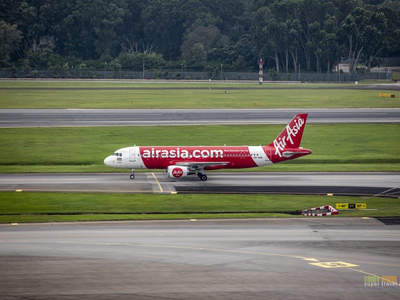 AirAsia aircraft taxiing at Singapore Changi Airport