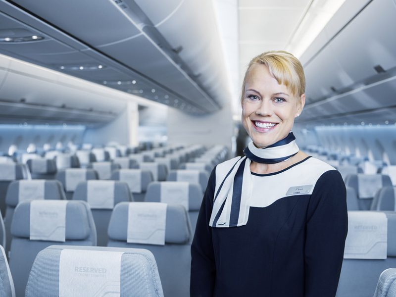 Finnair A350 economy class cabin with cabin crew member (Finnair photo)