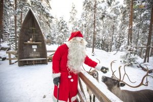 Santa Claus and Reindeers at The White Reindeer Park in Espoo, Finland