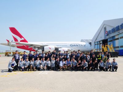 Employees of Korean Air and Qantas Airways pose together after Korean Air completed its first repaint of a Qantas A380 on May 24, at Korean Air’s painting facility at Gimhae International Airport. (Korean Air photo)
