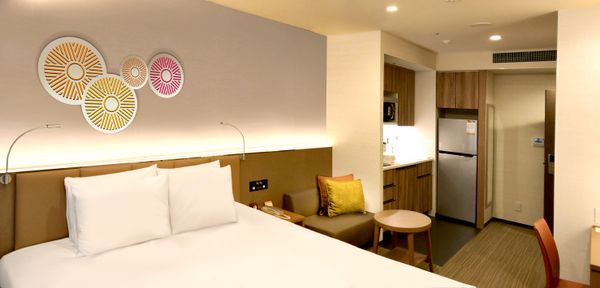 Holiday Inn & Suites Shin Osaka Suite room (IHG Photo)