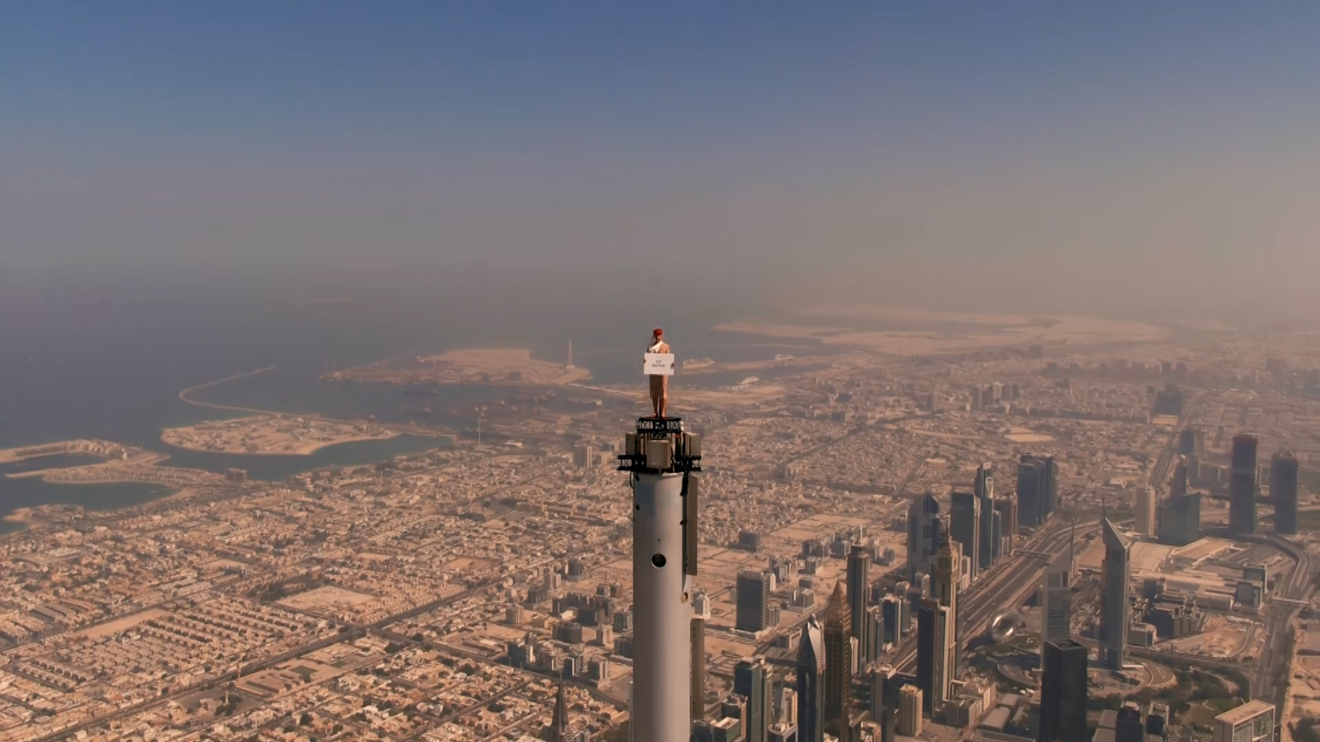 Emirates Cabin Crew on the tip of the Burj Khalifa by Emaar (Emirates photo)