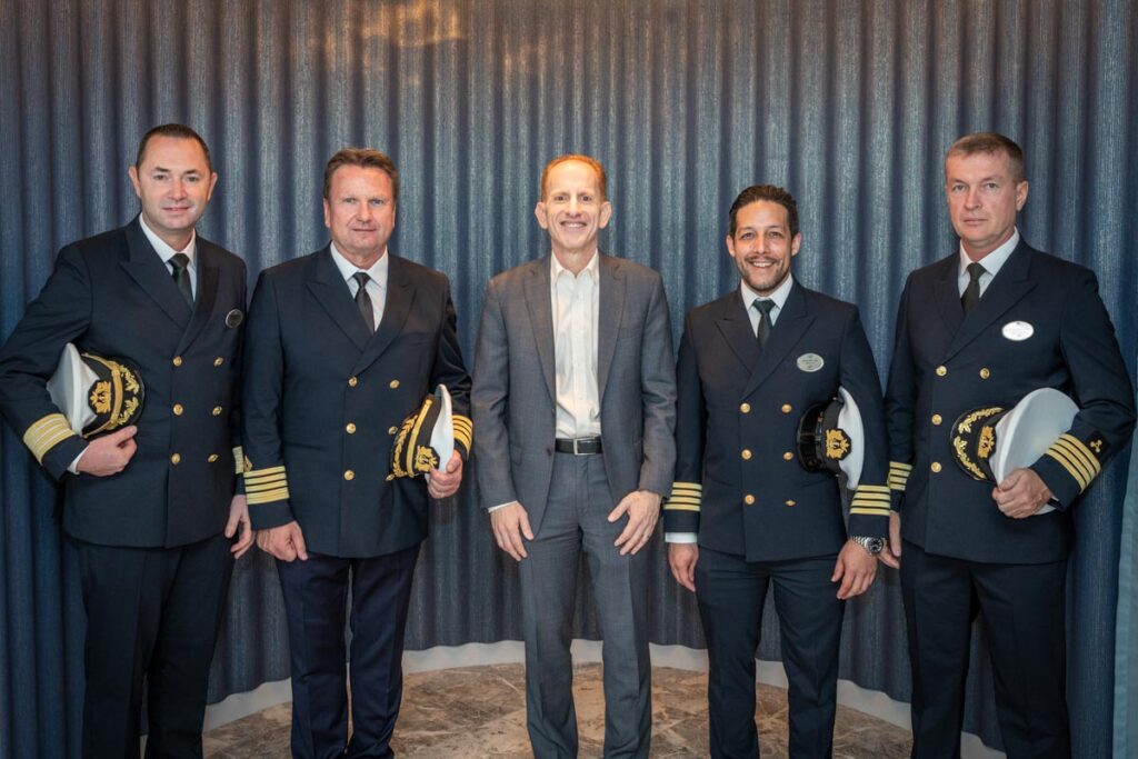 Norwegian Prima Delivery - General Manager Martin Ivanov, Captain Roger Gustavsen, President & CEO Harry Sommer, Staff Captain (NCL Photo)